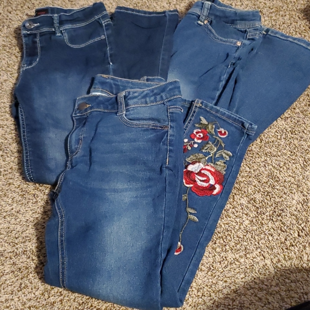 Three pair of girl jeans